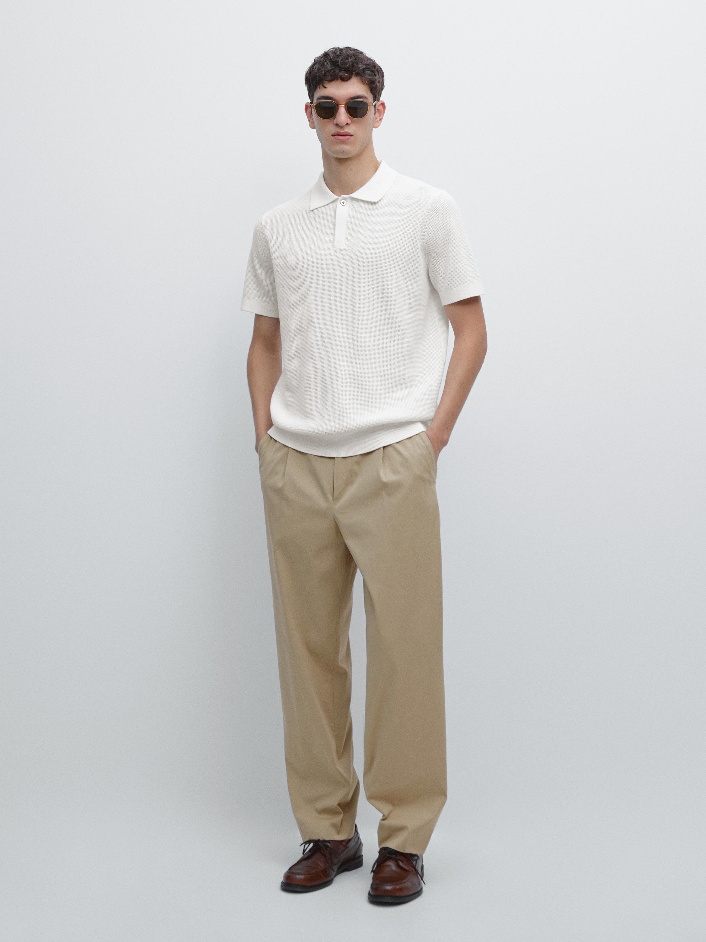 Polo en maille texturée de coton